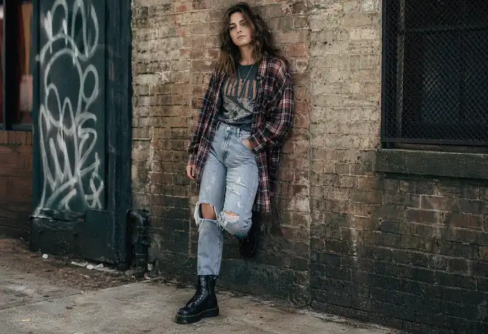 90s grunge woman flannel shirt combat boots