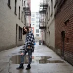 90s grunge fashion outfit with flannel and combat boots