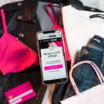 Fashion Nova discount codes displayed on a smartphone screen next to stylish clothing and shopping bags