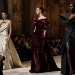 High fashion runway show in Paris with models in couture gowns
