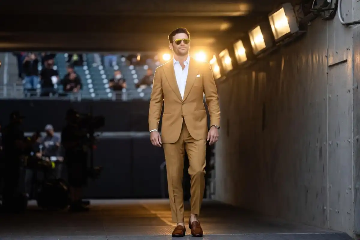 Joe Burrow tunnel walk in a tailored luxury suit with sunglasses