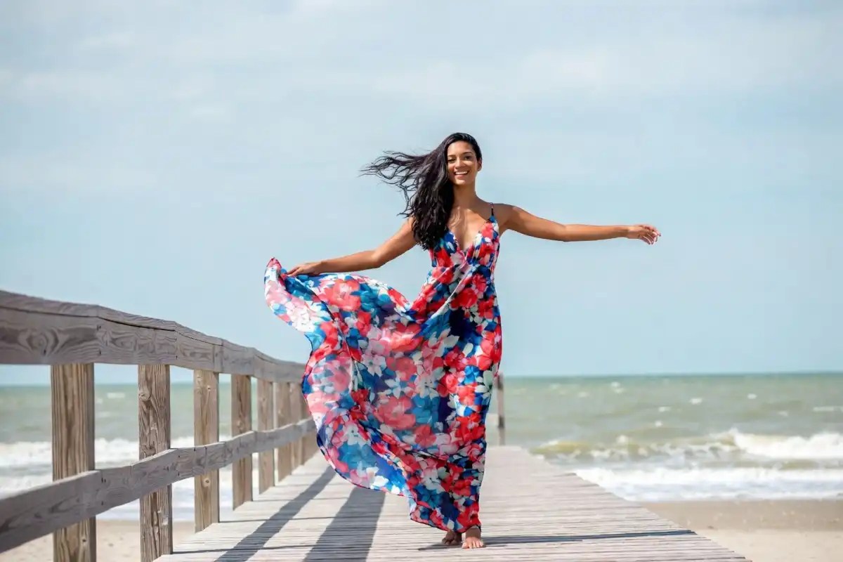 Woman in flowy maxi dress on a sunny vacation day