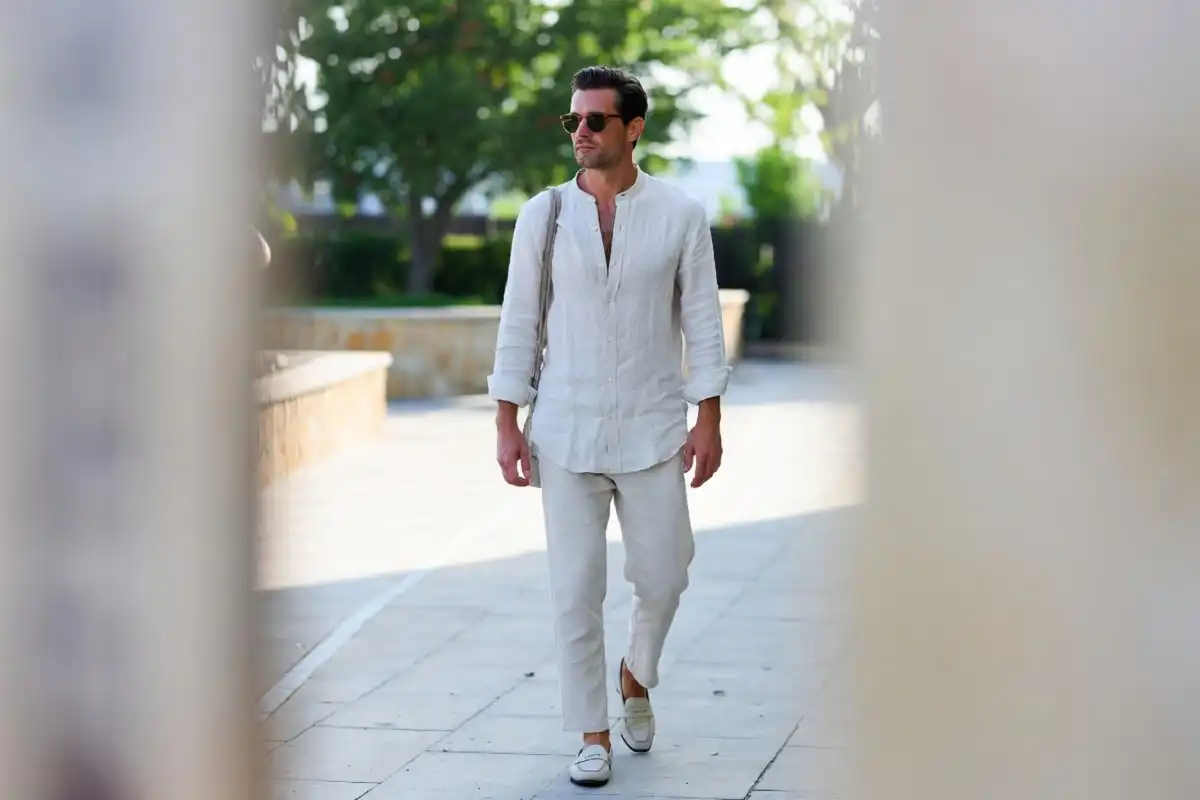 Man in a smart casual summer outfit with linen shirt and loafers